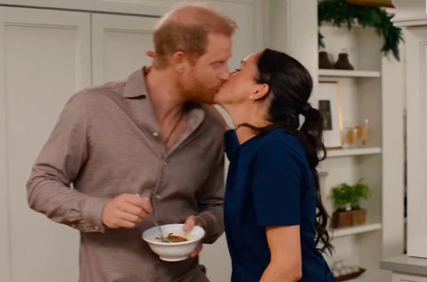 Harry and Meghan share a smooch in the trailer