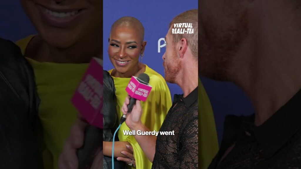 Katie Ginella runs into Guerdy on the carpet | Virtual Reali-Tea