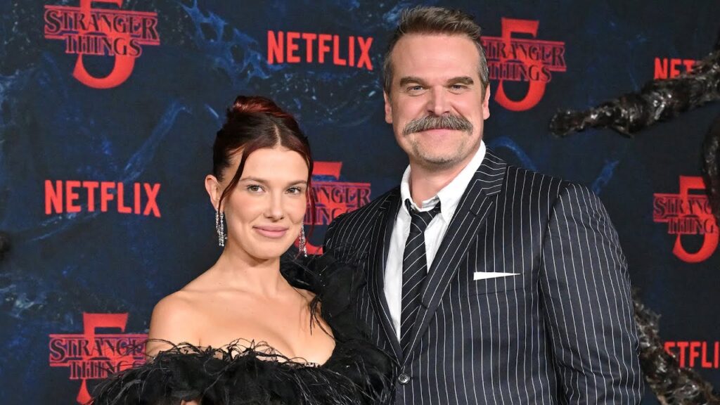 Millie Bobby Brown Details Feeling "Safe" Working With David Harbour on 'Stranger Things' Set