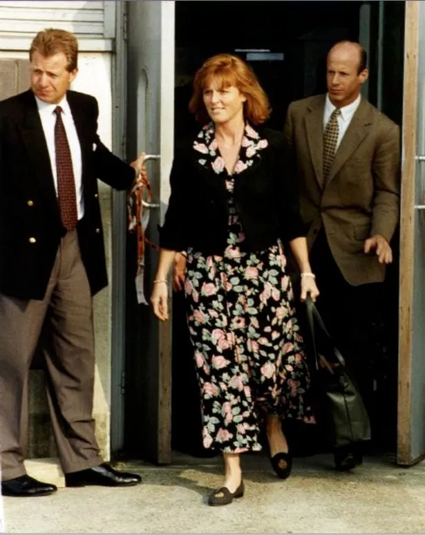 John Bryan Millionaire Businessman and the Duchess of York Sarah Ferguson leave by a back door at Heathrow Airport in London
