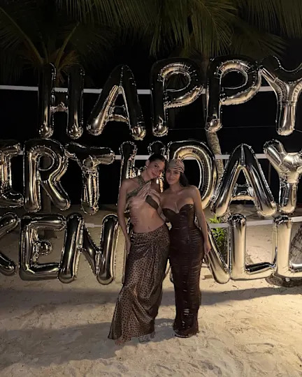 Kim Kardashian celebrated Kendall Jenner's 30th birthday in a skintight strapless dress