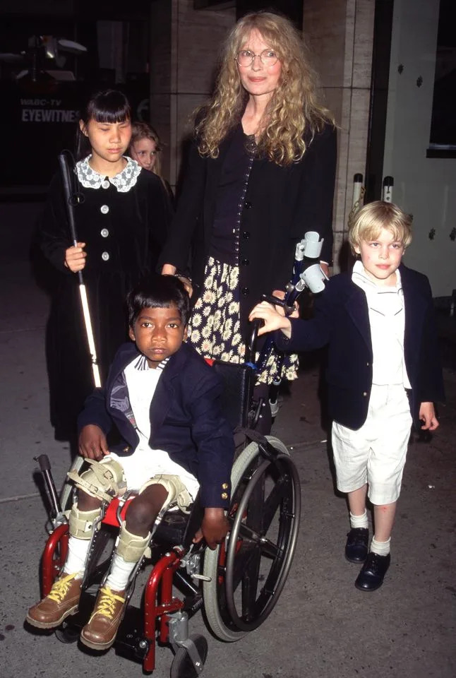 Victor Malafronte/Hulton Archive/Getty Mia Farrow with four of her children