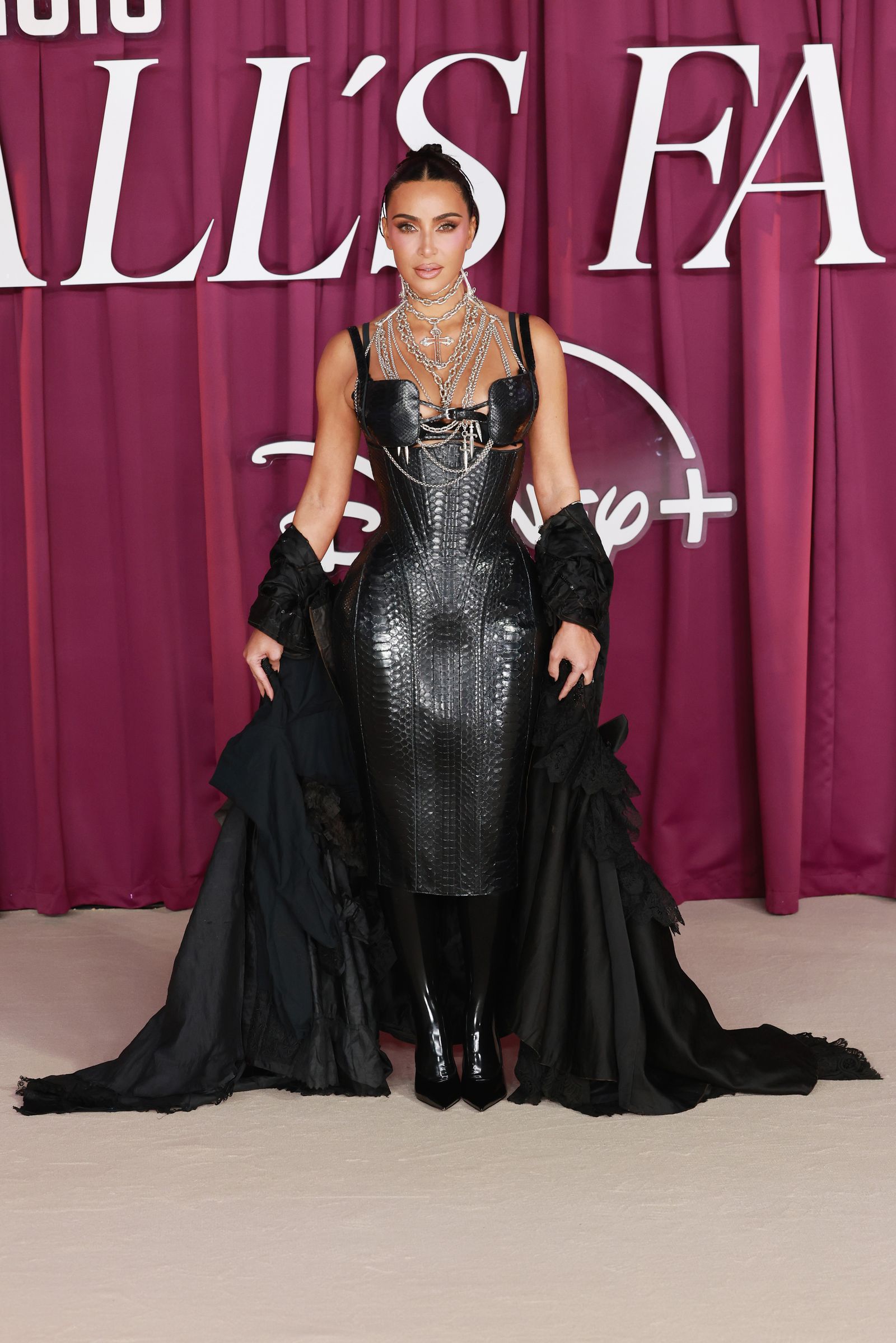 Image may contain Kim Kardashian Clothing Dress Fashion Adult Person Formal Wear Gown Evening Dress Face and Head