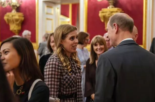 Princess Beatrice speaking to Prince Edward