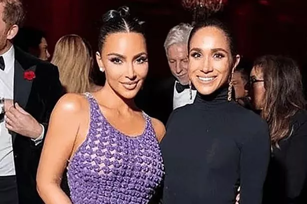 Kim pictured with Meghan at the bash