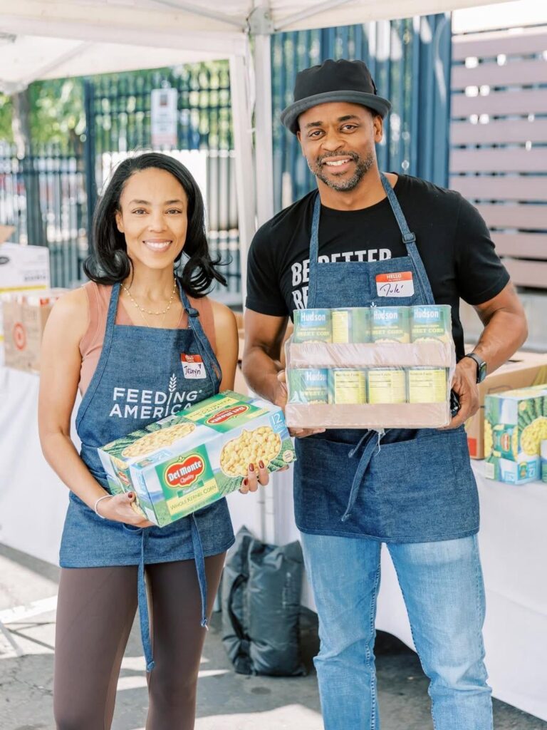 Dulé Hill and Jazmyn Simon volunteered with Feeding America to help prepare Thanksgiving meal kits