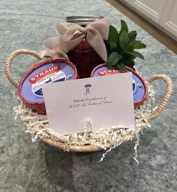 A photo of a gift hamper sent by Meghan Markle with a note to pal Jamie Kern Lima.