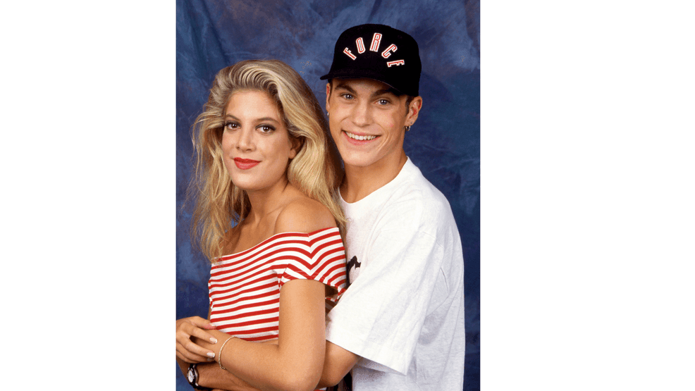 Actress Tori Spelling and actor Brian Austin Green, pose for a portrait circa 1992 in Los Angeles, California. Spelling and Green were co-stars on the television series Beverly Hills, 90210 as Donna Martin and David Silver, respectively. (Photo by Ron Davis/Getty Images)