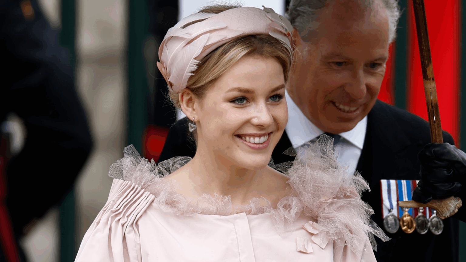 Margarita Armstrong-Jones wearing a pink headband and dress
