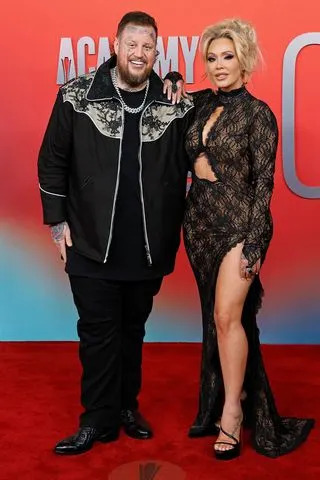 Taylor Hill/WireImage Jelly Roll and Bunnie Xo in May 2025.