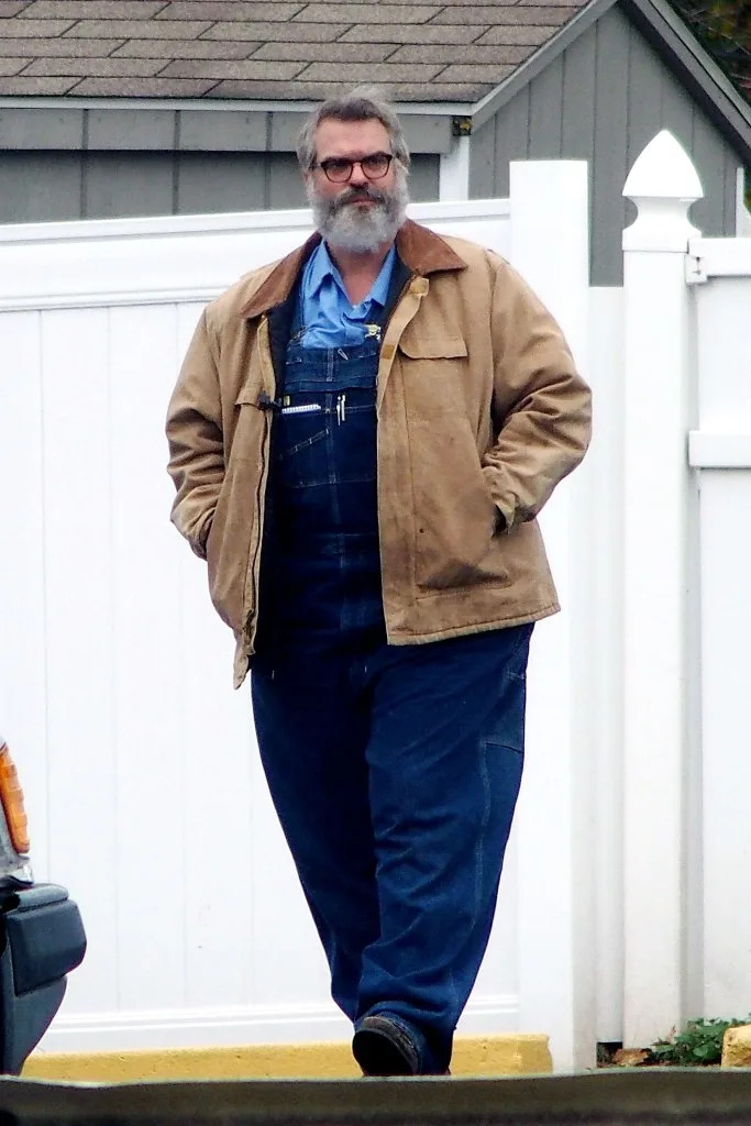 The actor wore a fat suit beneath his short-sleeved shirt, overalls and jacket. GC Images