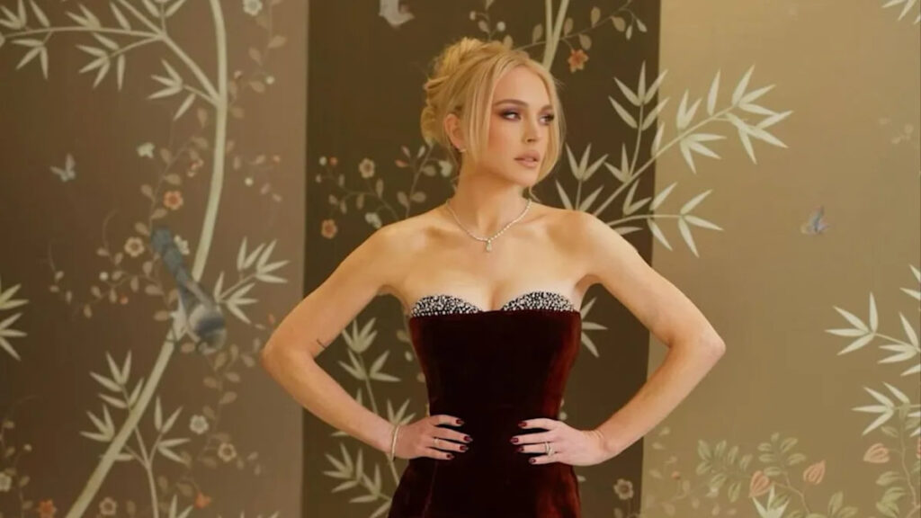 Lindsay Lohan turns heads in velvet burgundy gown at Fashion Trust Arabia Awards, shop her look for less Yahoo creators home
