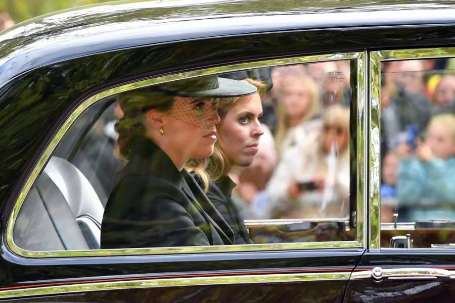 LONDON, ENGLAND – SEPTEMBER 19: Princess Beatrice, recently appointed as Counsellor of State (L) and Princess Eugenie of York leave Westminster Abbey during the State Funeral of Queen Elizabeth II on September 19, 2022 in London, England. Elizabeth Alexandra Mary Windsor was born in Bruton Street, Mayfair, London on 21 April 1926. She married Prince Philip in 1947 and ascended the throne of the United Kingdom and Commonwealth on 6 February 1952 after the death of her Father, King George VI. Queen Elizabeth II died at Balmoral Castle in Scotland on September 8, 2022, and is succeeded by her eldest son, King Charles III. (Photo by Anthony Devlin/Getty Images)
