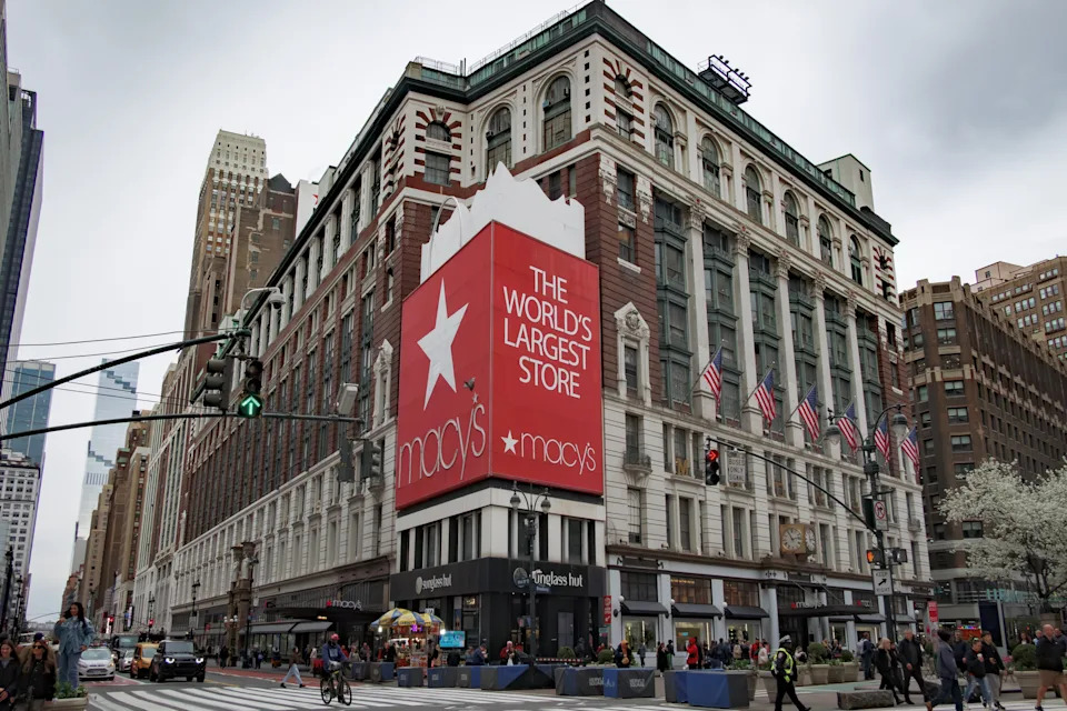 Macy's Herald Square in NYC, labeled as "The World's Largest Store," showing the iconic red sign on the historic building