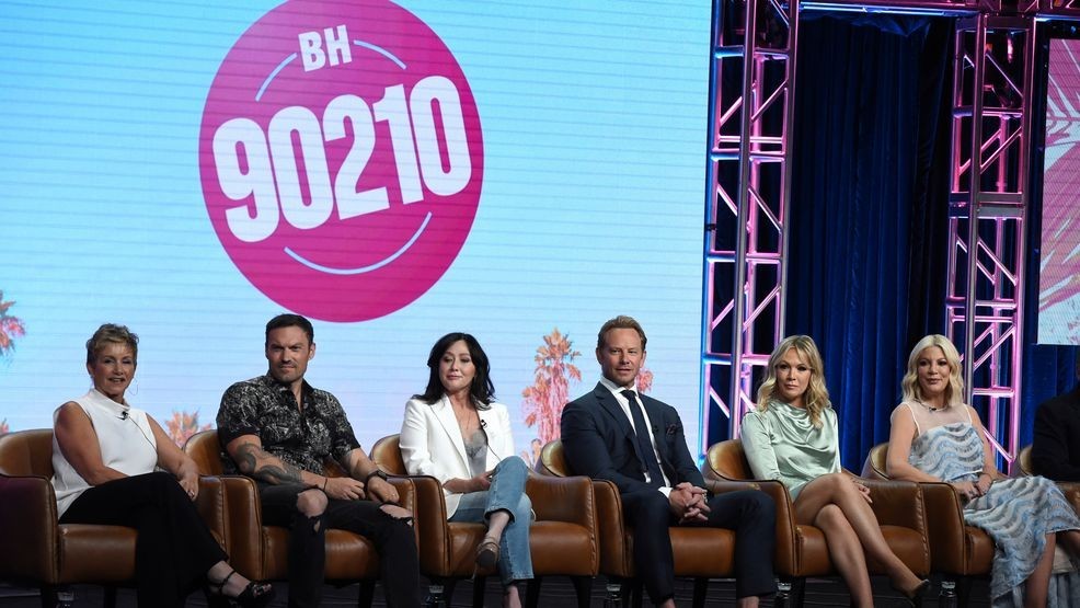 Gabrielle Carteris, from left, Brian Austin Green, Shannen Doherty, Ian Ziering, Jennie Garth and Tori Spelling participate in Fox's "BH90210" panel at the Television Critics Association Summer Press Tour on Aug. 7, 2019, in Beverly Hills, Calif. (Credit: Chris Pizzello/Invision/AP, File)