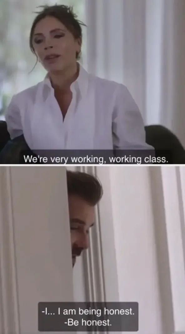 Victoria Beckham in a blouse speaks, "We're very working, working class." David Beckham responds from behind a door, "Be honest."