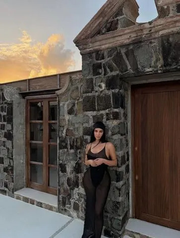 Instagram/Kim Kardashian Kim Kardashian freed the nipple in a sheer black naked dress on November 7