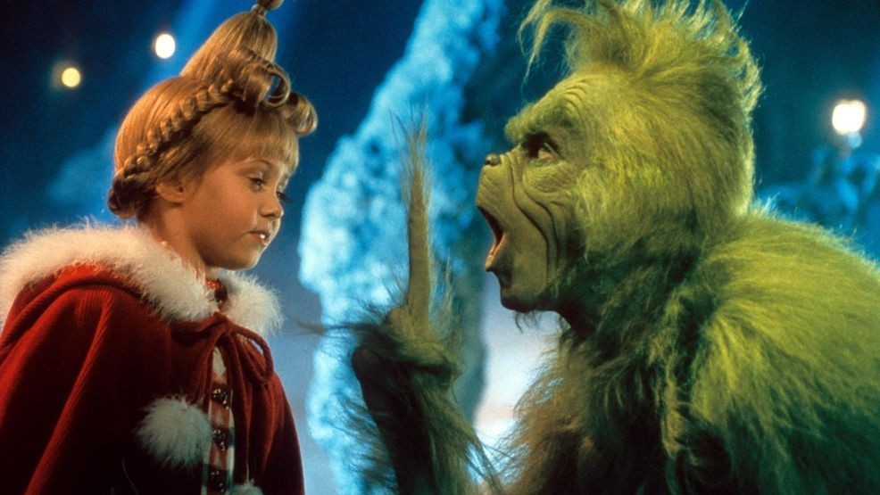 Taylor Momsen listening to Jim Carrey in a scene from the film 'How The Grinch Stole Christmas', 2000. (Photo by Universal/Getty Images)