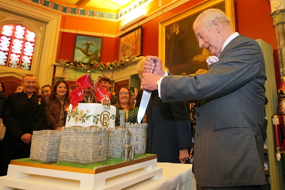 Getty King Charles cutting his birthday cake