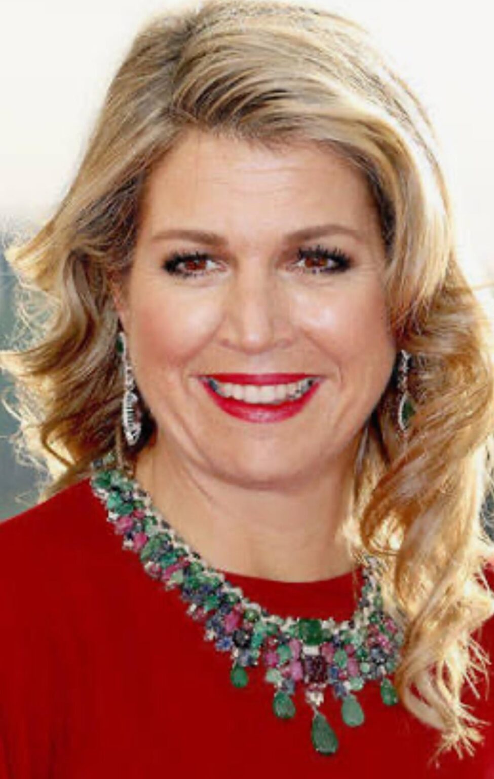Queen Maxima in her Tutti Frutti necklace and bracelet set.