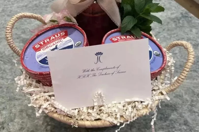 A photo of a gift hamper sent by Meghan Markle with a note to pal Jamie Kern Lima.