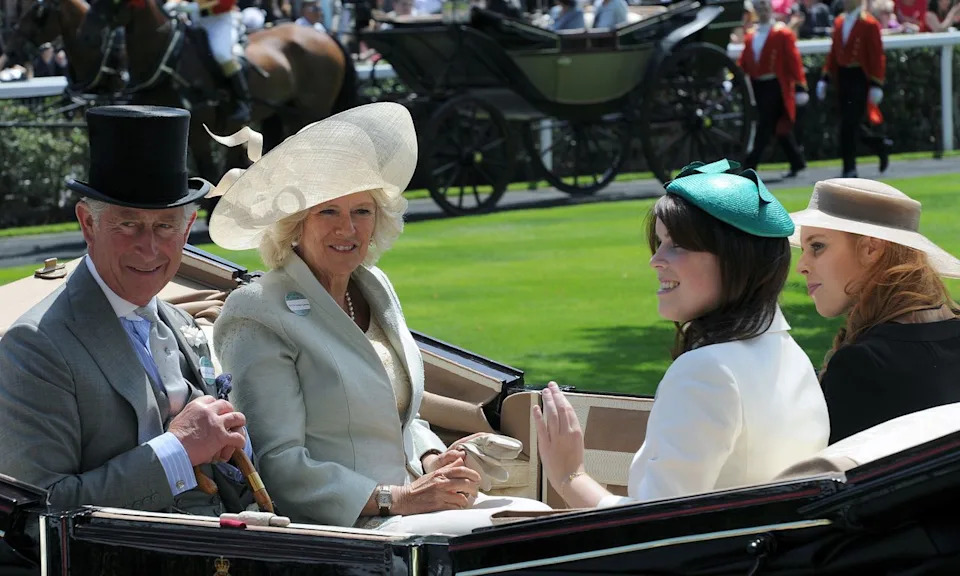 Getty King Charles III, Queen Camilla, Princess Eugenie, and Princess Beatrice in 2011.