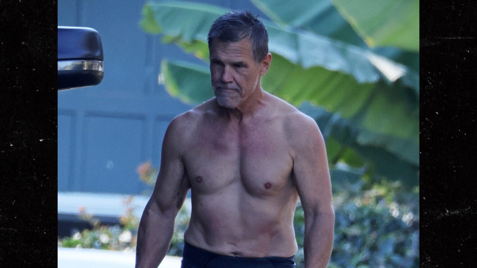 Josh Brolin Reveals Massive Lighthouse Back Tattoo While Surfing Josh Brolin Reveals Massive Lighthouse Back Tattoo While Surfing