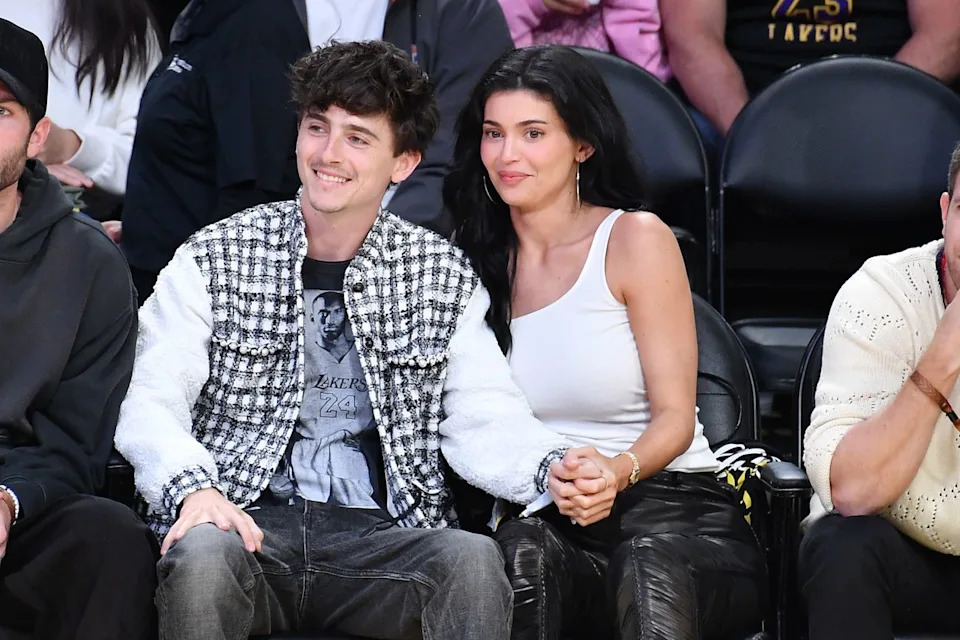 Getty Images Timothée Chalamet and Kylie Jenner sitting courtside at a Los Angeles Lakers game in 2025.