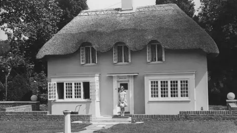 Getty Images Princess Elizabeth stood outside Y Bwthyn Bach in Royal Lodge, Windsor
