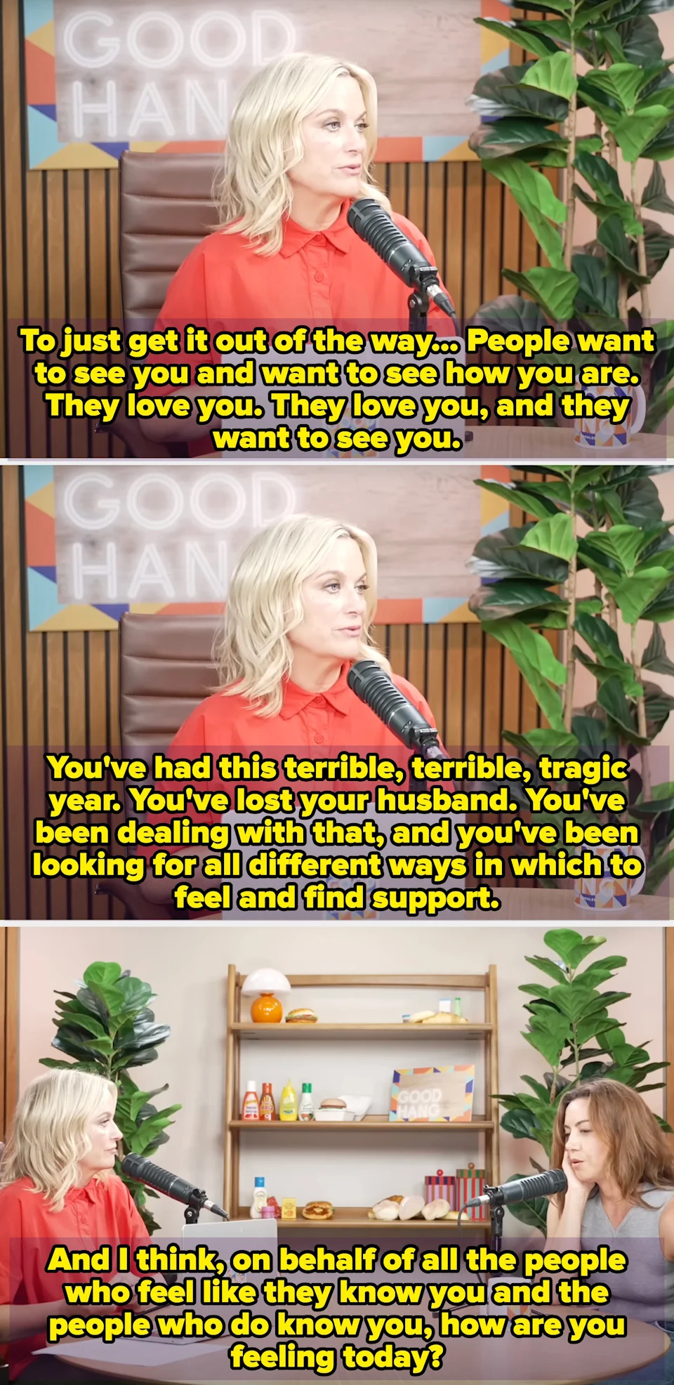 Person with blonde hair wearing a red shirt speaks into a microphone during a podcast recording, seated at a table with a laptop and mug