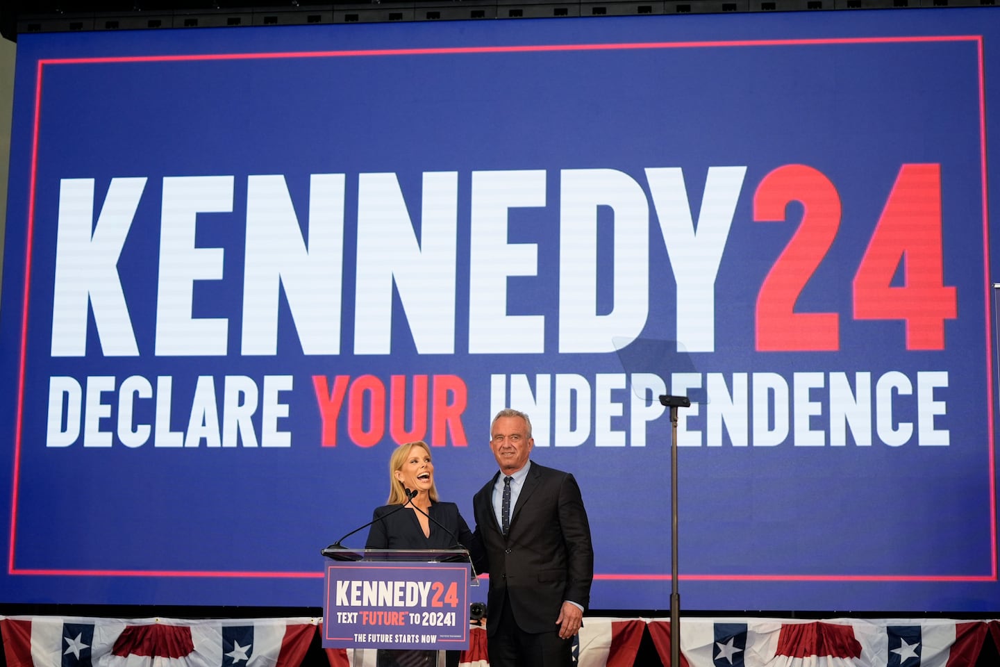 Robert F. Kennedy Jr. was joined on the stage by his wife Cheryl Hines during a campaign event in March 2024, in Oakland, Calif.