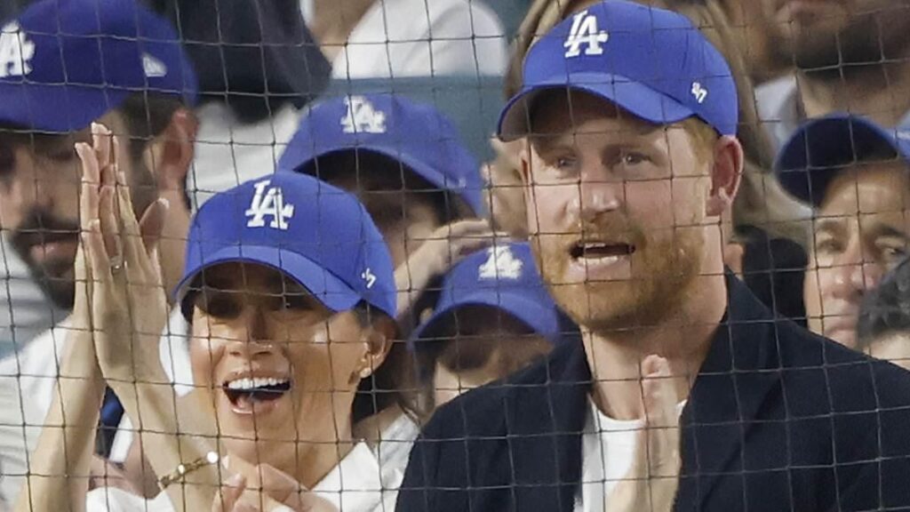 Prince Harry and Meghan were invited to LA Dodgers game by billionaire owner Mark Walter who faces fan backlash 'over his company's links to ICE immigration detention centres'