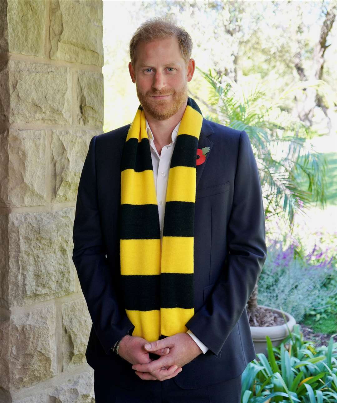 Prince Harry wearing a Scotty's Little Soldiers scarf. Picture: Archewell
