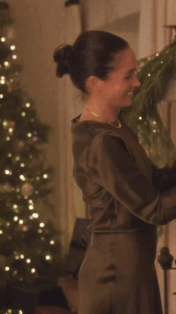 Meghan on color scheme stuffing a Christmas stocking for As Ever Instagram page