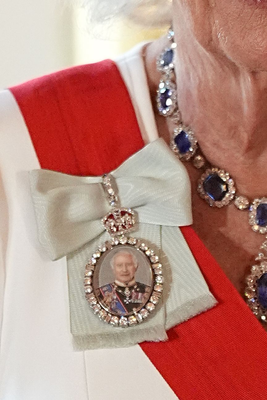 Image may contain John Lee Baron Lee of Trafford Accessories Jewelry Necklace Pendant Adult Person and Wedding