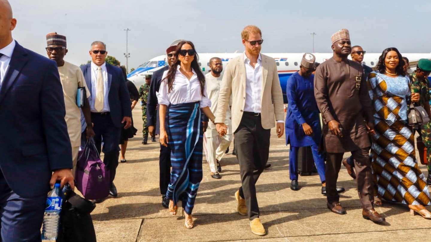Prince Harry, Duke of Sussex and Meghan, Duchess of Sussex arrive at the Lagos airport for Official State Welcome