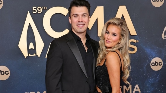 (L-R) Cole Neuber and Mackenzie Carpenter attend the 59th Annual CMA Awards at Music City Center on November 19, 2025 in Nashville, Tennessee(Getty Images via AFP)