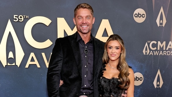 Brett Young and Taylor Mills attend the 59th Annual CMA Awards at Music City Center on November 19, 2025 in Nashville, Tennessee(Getty Images via AFP)