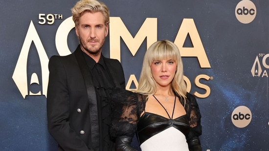 Johnny Costello and Kimberly Perry attend the 59th Annual CMA Awards at Music City Center on November 19, 2025 in Nashville, Tennessee(Getty Images via AFP)