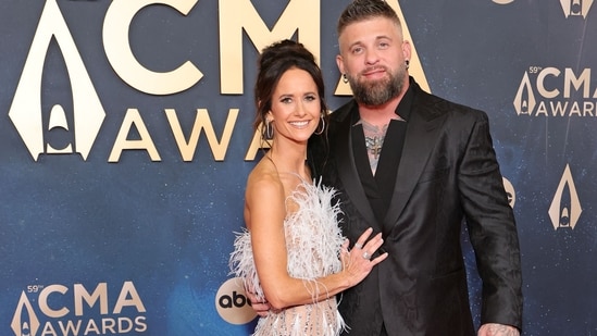 Amber Cochran Gilbert and Brantley Gilbert attend the 59th Annual CMA Awards at Music City Center on November 19, 2025 in Nashville, Tennessee.(Getty Images via AFP)