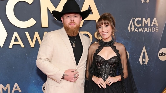 (L-R) Tyler Braden and guest attend the 59th Annual CMA Awards at Music City Center on November 19, 2025 in Nashville, Tennessee.(Getty Images via AFP)