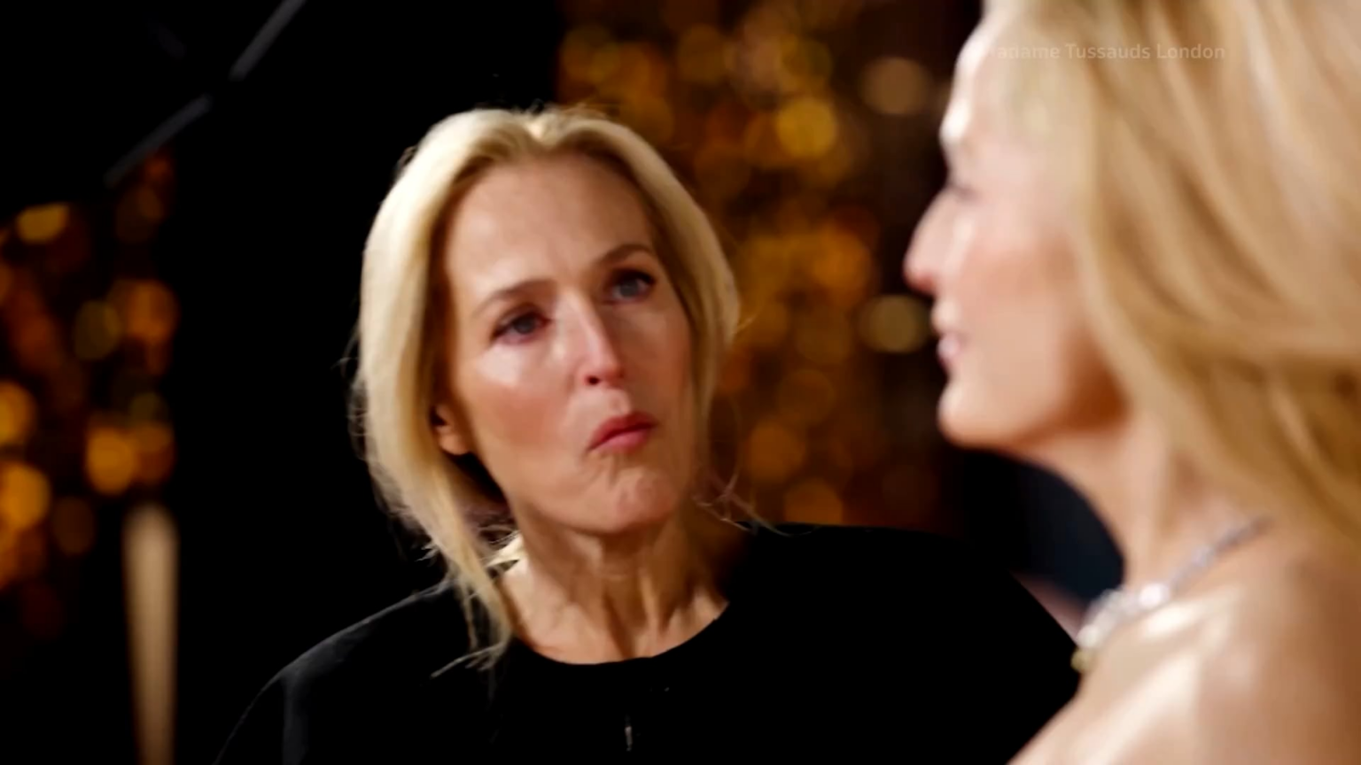 Gillian Anderson meeting her new Madame Tussauds wax figure in London. The figure is wearing her famous Gabriela Hearst “Vulva Gown” from the 2024 Golden Globes