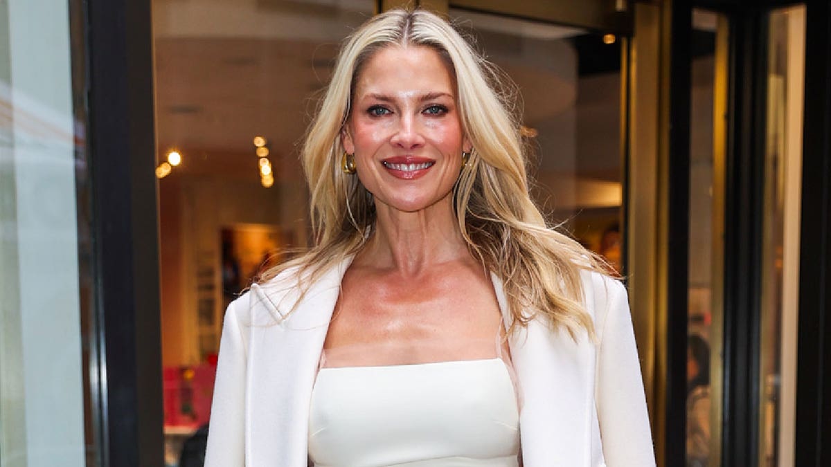 Ali Larter in a white dress and jacket while outside the Today Show in New York in November 2025