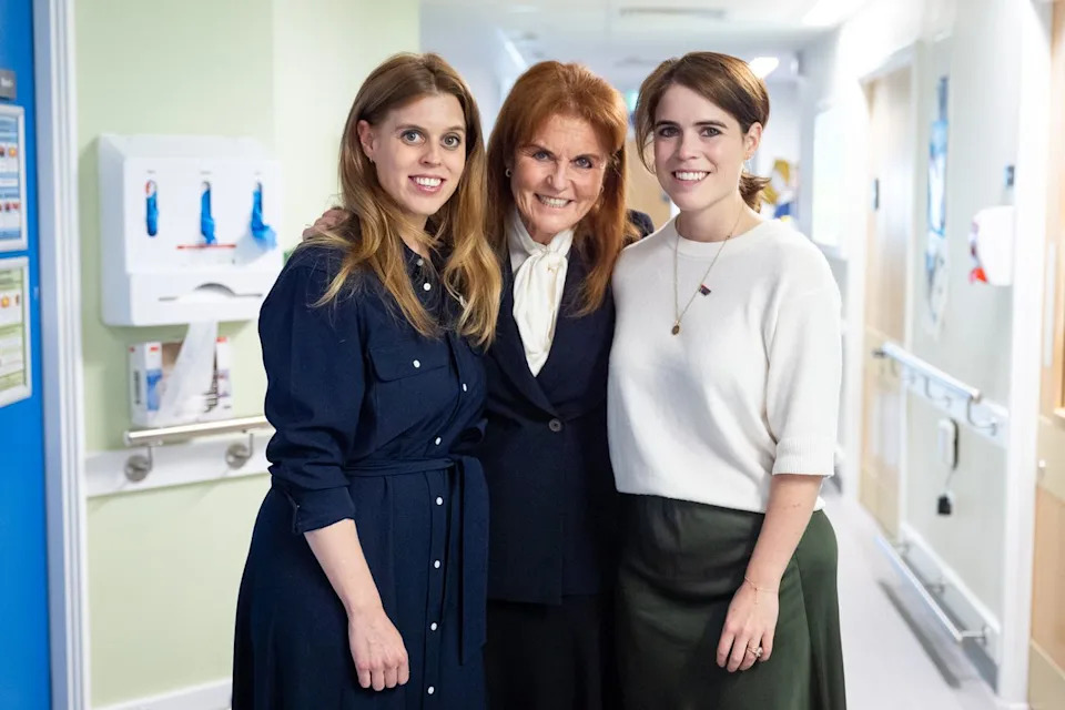 Getty Images Sarah, Duchess of York with her daughters Princess Beatrice and Princess Eugenie during a visit to the Teenage Cancer Trust unit at University College Hospital, London on April 23