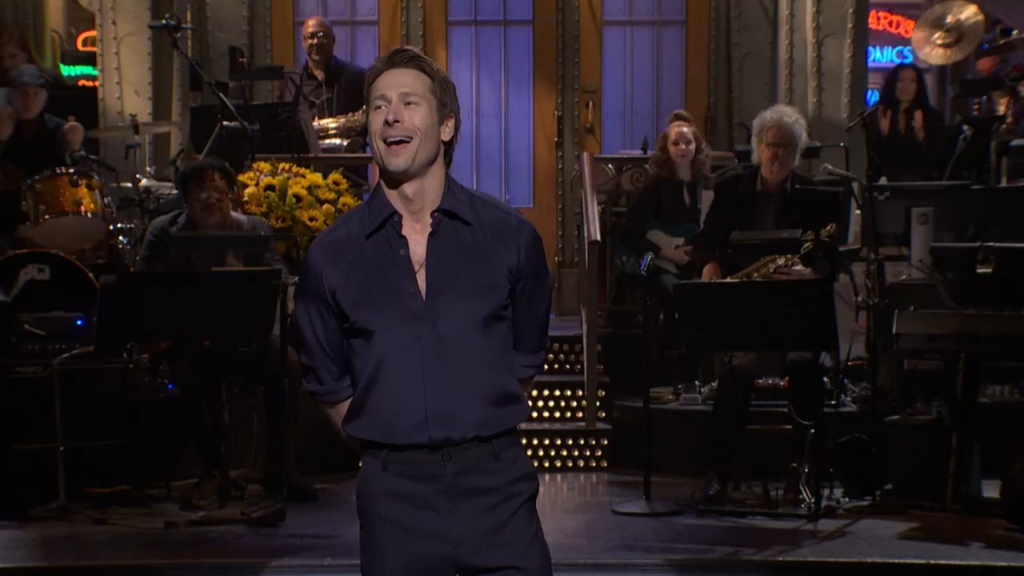 Glen Powell's SNL monologue where he brought out the UPS driver that was delivering a package when he first heard he would host in 2021 (before it got cancelled): "“But if I have learned anything, it is that the best things in life don’t happen overnight, and no one knows that better than UPS.”