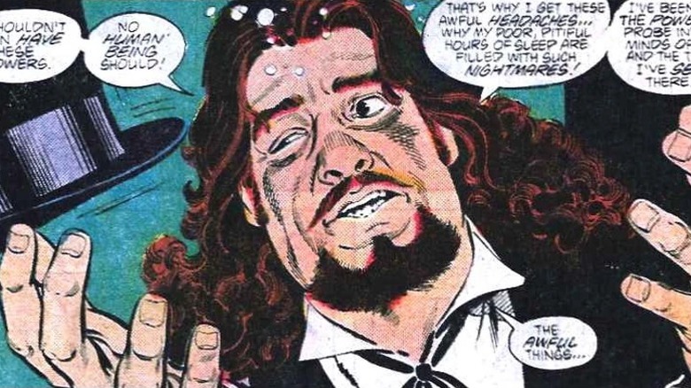 Milton Fine holding a top hat and looking desperate in Superman