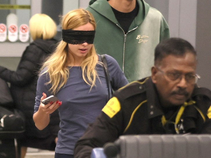 addison rae airport blindfold backgrid