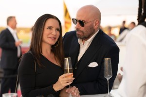 CASH OUT, from left: Kristin Davis, John Travolta, 2024. © Saban Films / Courtesy Everett Collection