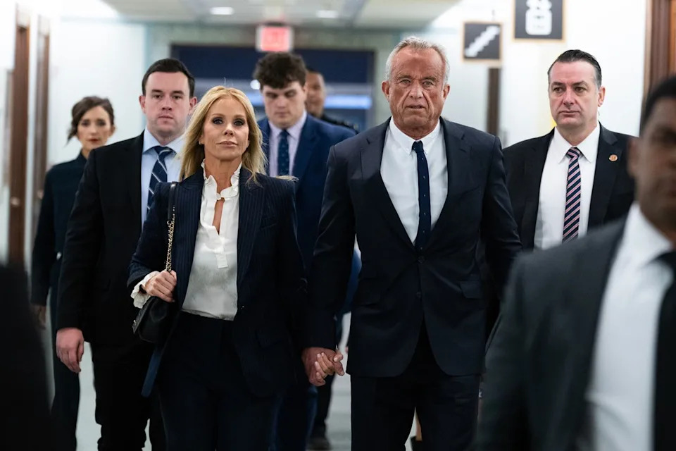 Tom Williams/CQ-Roll Call, Inc via Getty  Cheryl Hines and Robert F. Kennedy Jr. attend his Senate confirmation hearing on Jan. 29, 2025