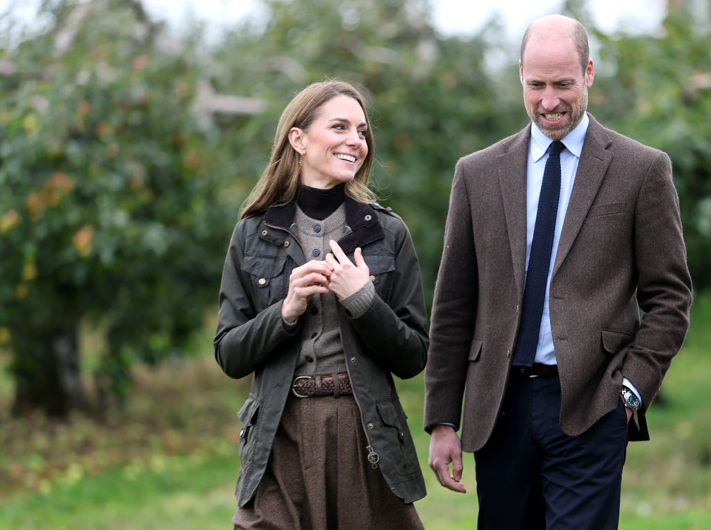 Catherine, Princess of Wales and Prince William, Prince of Wales walk in the orchards as they visit to Long Meadow Cider on October 14, 2025 